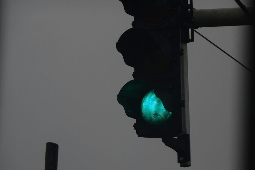 a traffic light with a green light on it